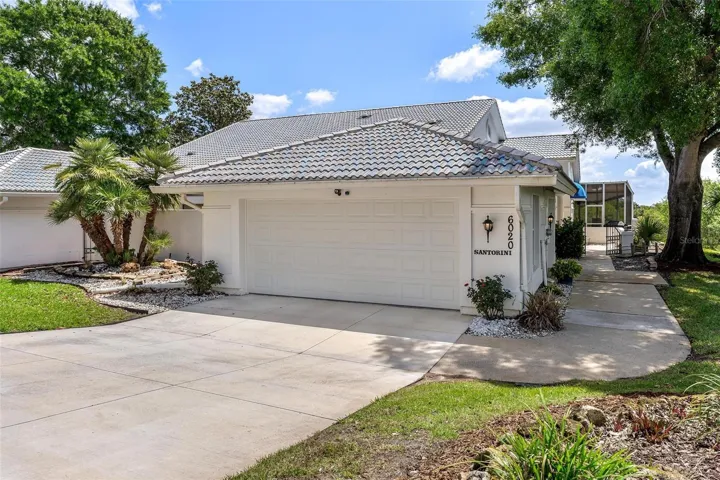 Walkway leads to side entry golf cart access and Front door...