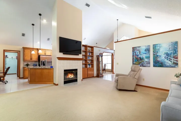Enjoy the wood burning fireplace and openness of the kitchen.