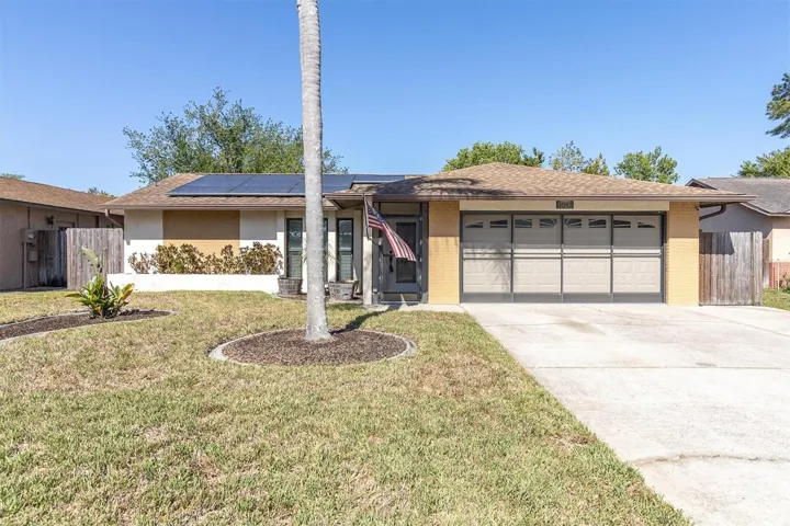 Front exterior with 2-car garage