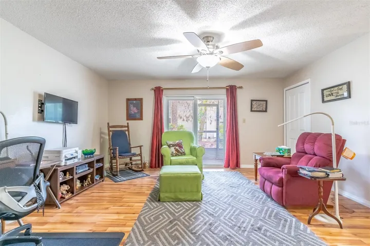 Living Room with Sliding Doors to Screened-In Patio