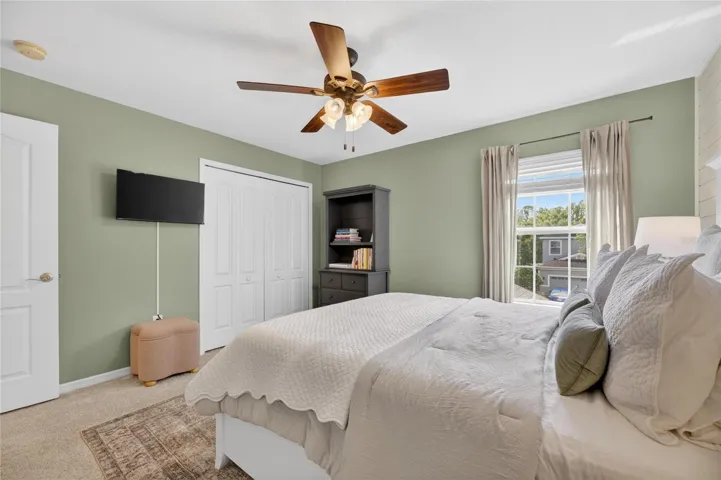 Upstairs guestroom 1 fas an overhead fan