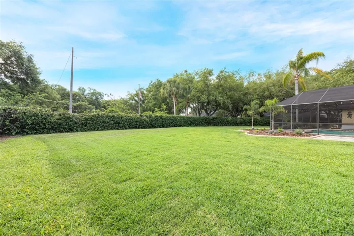 The extremely spacious backyard is completely fenced in!