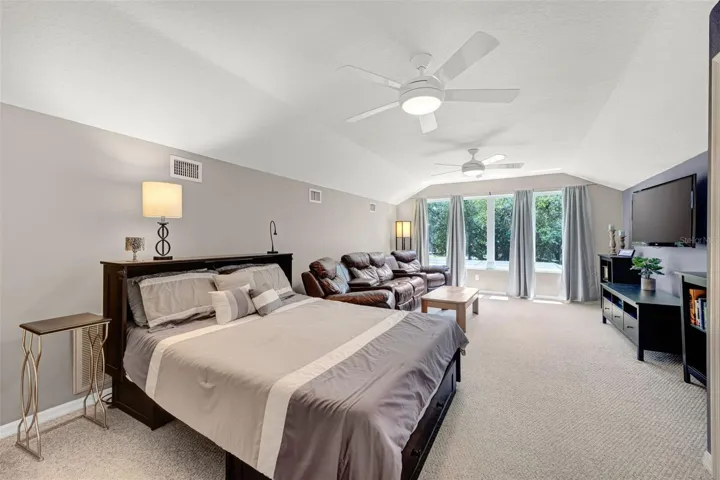 Oversized Upstairs Bonus Room with 2 lighted ceiling fans