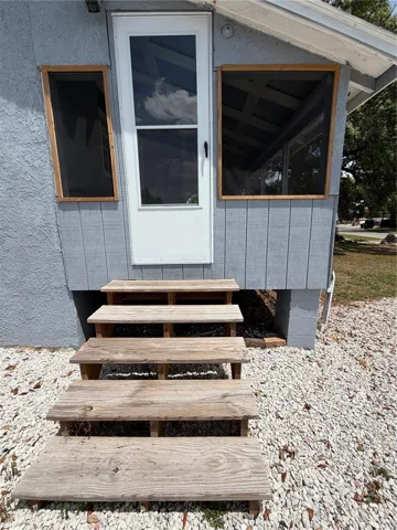 Steps and Entry Door to Front Porch and Home