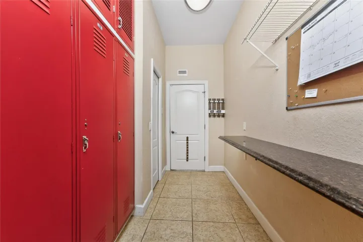 This is where the washer and dryer were - behind these red lockers. They were just reversed to the other side of this wall.