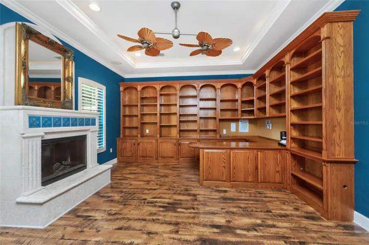 Library has tons of built in bookcases!