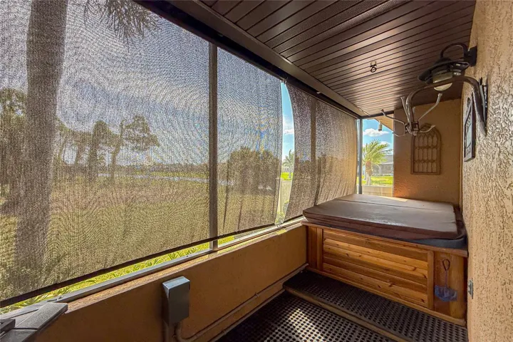 This private  lanai is just off the Primary bedroom and has a hot tub!