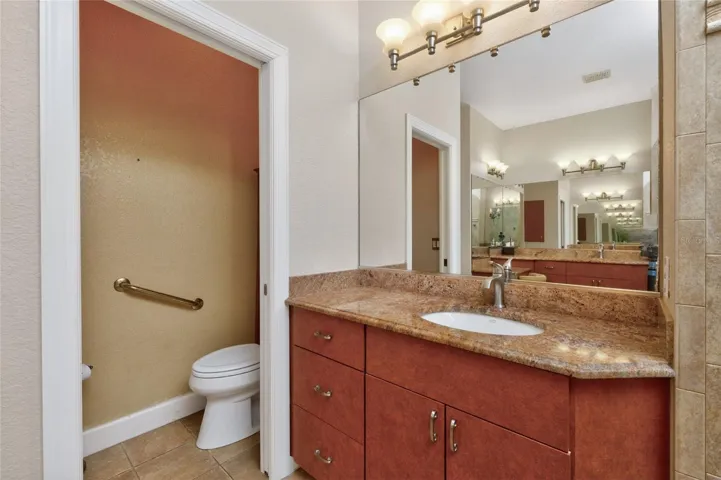 Primary bath - 2nd vanity and privacy commode area