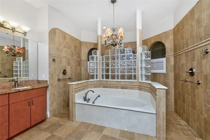 Primary bath has a chandelier!