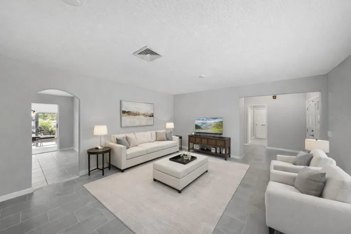 Living Room with NEW Porcelain Tile and Fresh Paint- NO POPCORN CEILINGS!