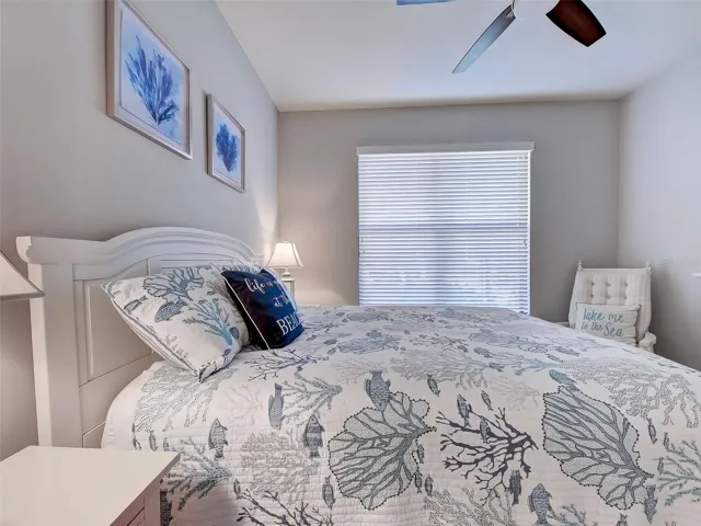 Double window in spacious guest bedroom