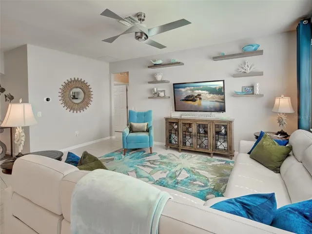 Gathering Room with top of the line Ceiling Fan, Custom Paint and Shelving