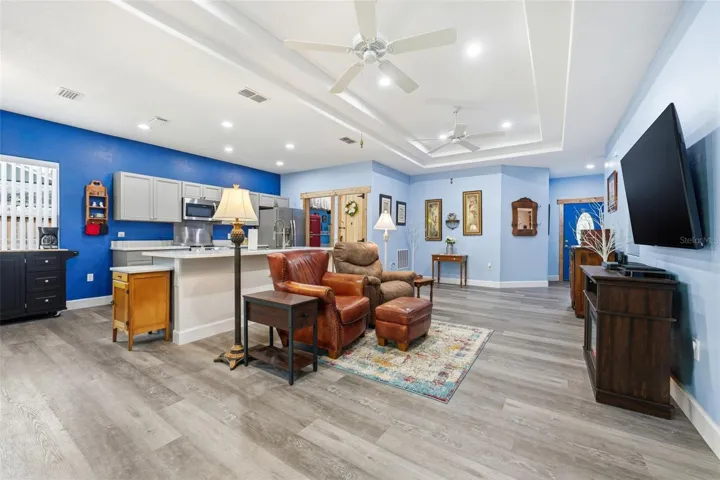 Living room with dining area in the background