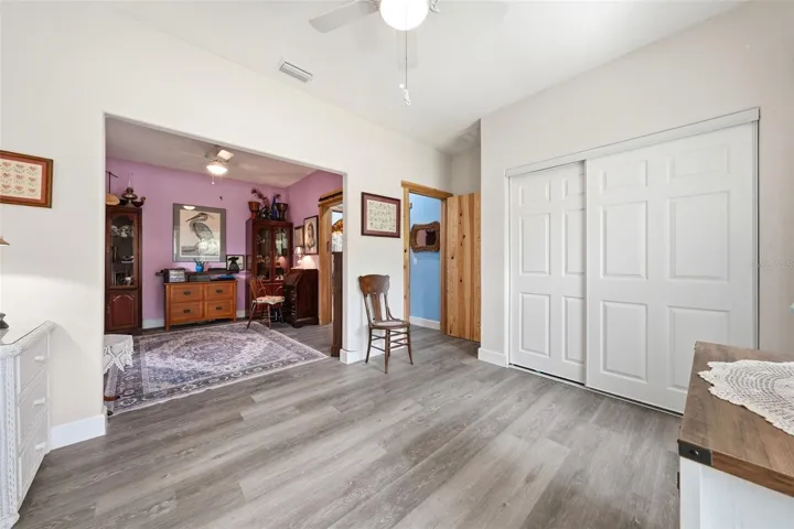Guest bedroom with view of adjoing den/office or third bedroom