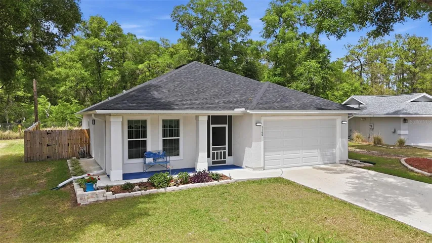 Cozy front porch and a newly screened entry way