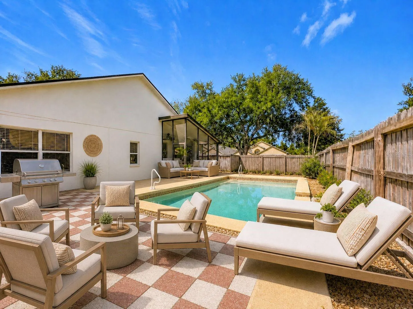 Your private outdoor oasis featuring a pristine pool completely resurfaced in June 2026.