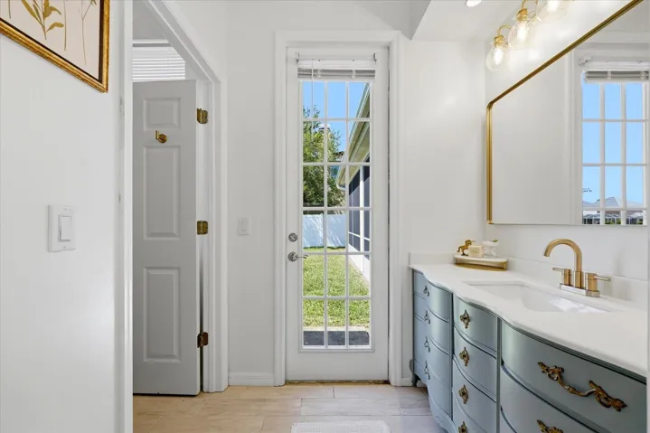 Guest bathroom with Exit to the Backyard