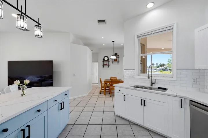 Updated Cabinetry & Countertops, Sink with Views of the Waters