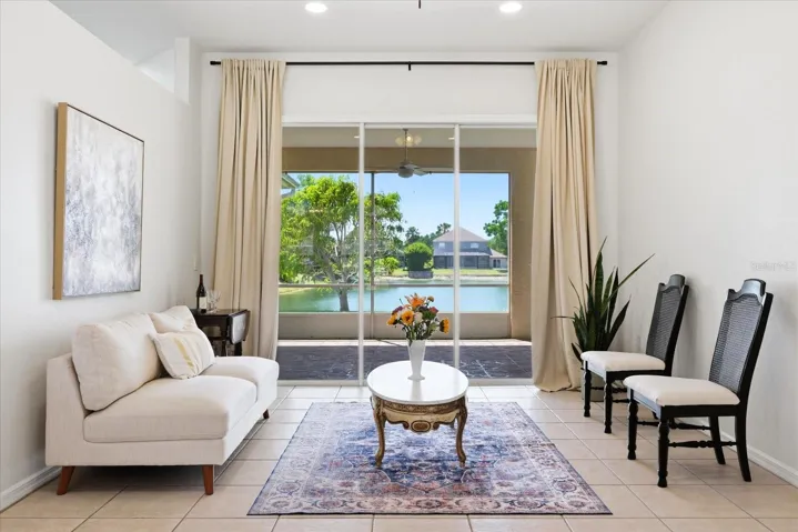 Intentional Living Space with Large Windows & Sliders brining the outdoors to the indoors