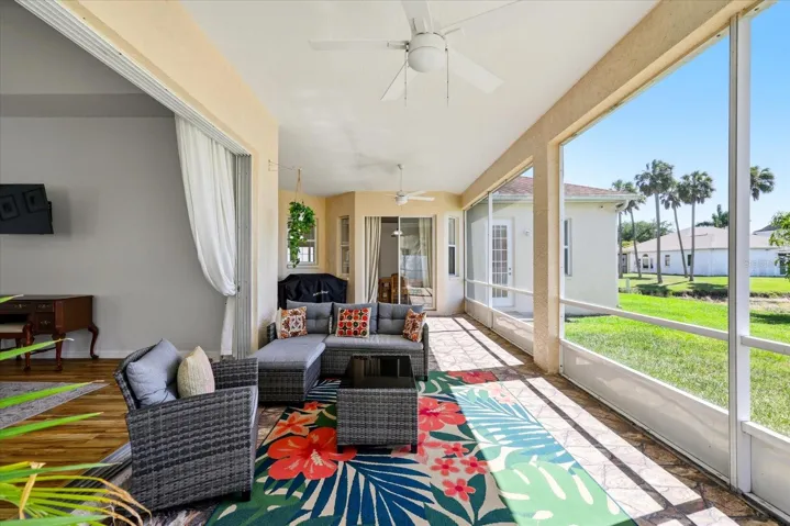 500 Sq Ft screened and roof-covered lanai—your private outdoor retreat for relaxing and entertaining year-round.