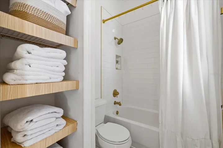 Separate Water room with Toilet, Bath/Shower Combo with Plenty of Storage