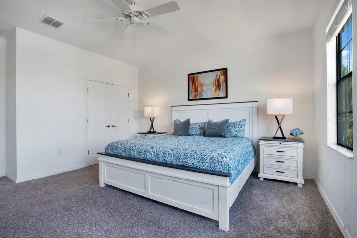 Secondary bedroom with flexible use for guests or office.