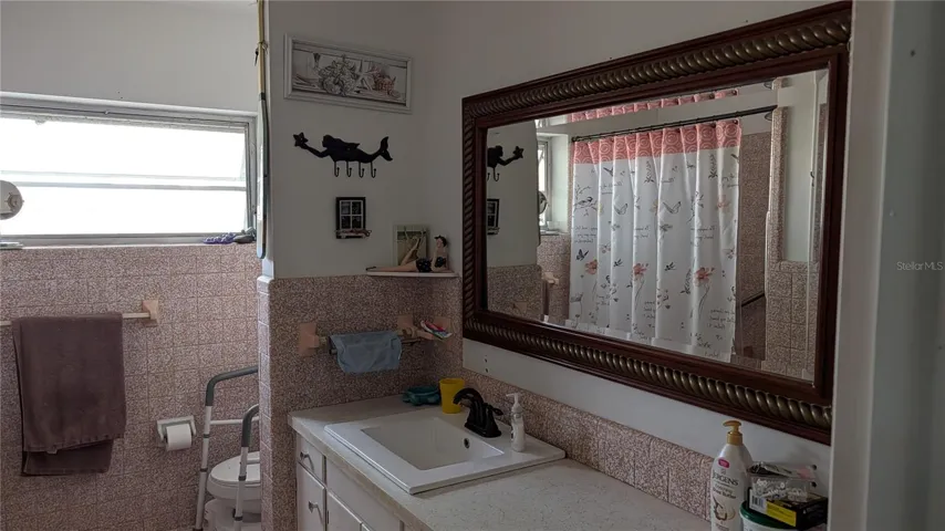 bathroom with double linen closet