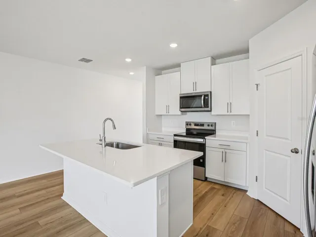 Interior photos are not of the actual home but are photos of the builder home with the same floorplan with similar interior finishes and features.