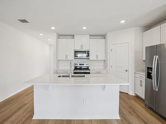 Interior photos are not of the actual home but are photos of the builder home with the same floorplan with similar interior finishes and features.