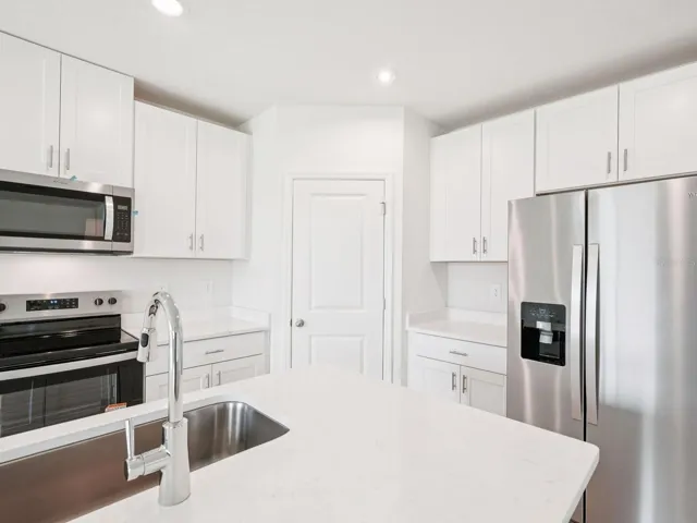 Interior photos are not of the actual home but are photos of the builder home with the same floorplan with similar interior finishes and features.