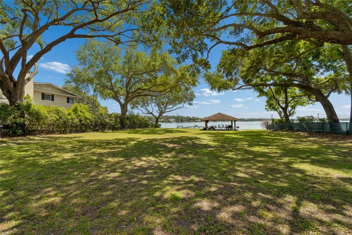 PRIVATE ACCESS COMMUNITY DOCK WITH A BOAT LIFT AND A CABANA