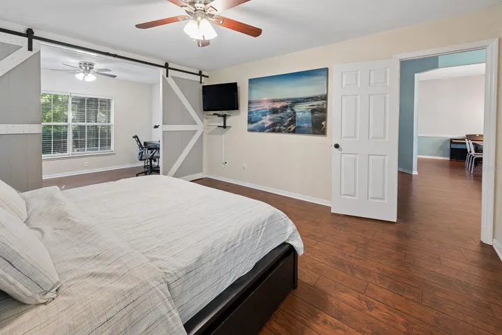 Primary bedroom with adjacent office/bonus space