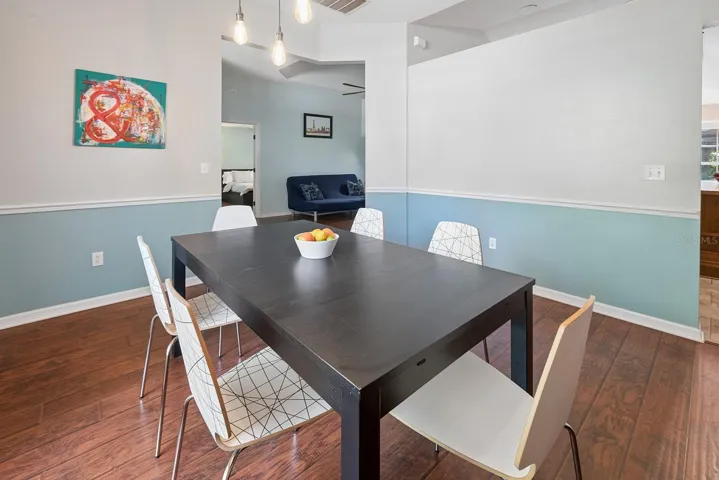 Formal dining room leading to formal living room