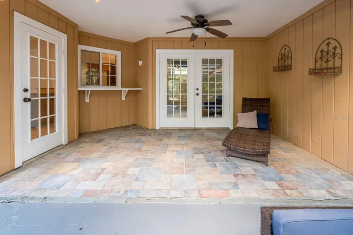 Covered back porch with kitchen pass-through