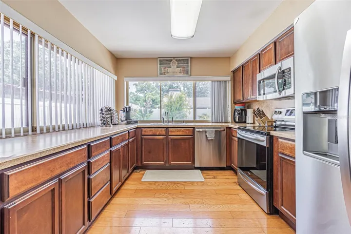 Kitchen with pass through windows
