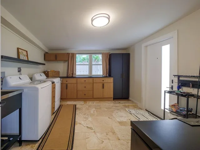 Utility Room with Matching Custom Cabinetry