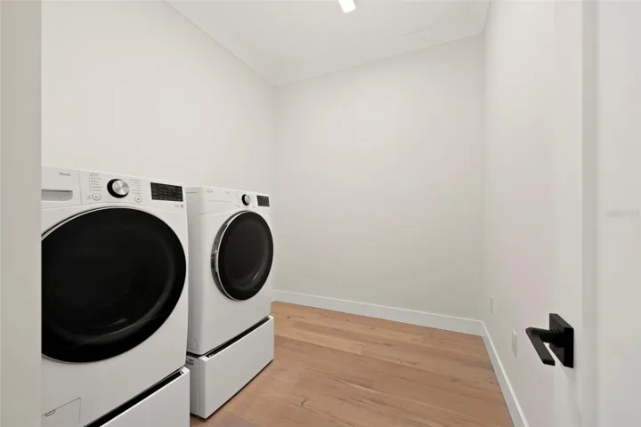 Additional laundry room located upstairs
