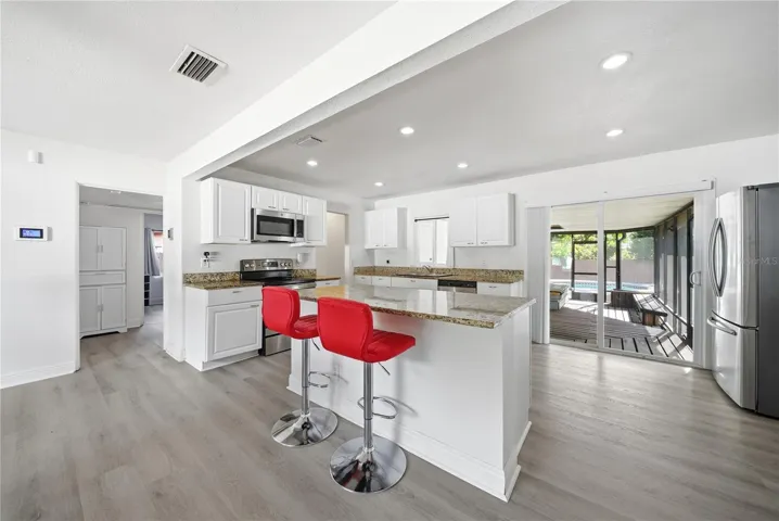New kitchen appliances & large island perfect for meal prep days