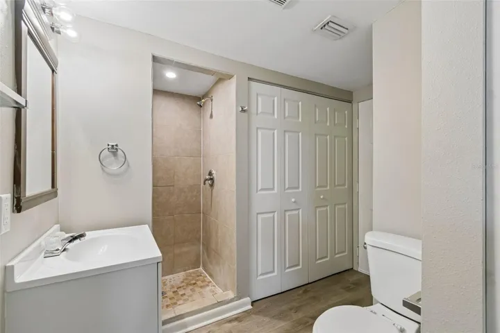 Bathroom - Utility closet inside folding doors