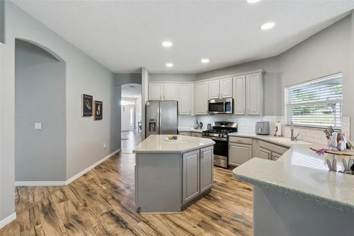 Stainless Steel Appliance Package with Gas Range , Recessed Lighting and Touchless Gooseneck Faucet