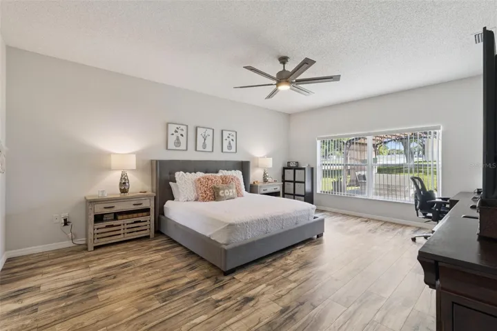 Primary Bedroom offers views of the Backyard