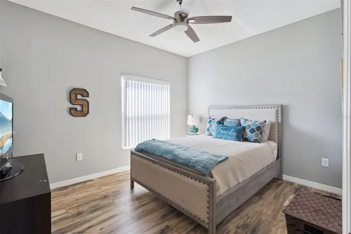 Bedroom #3 with Remote Control Ceiling Fan & Vinyl Plank Flooring