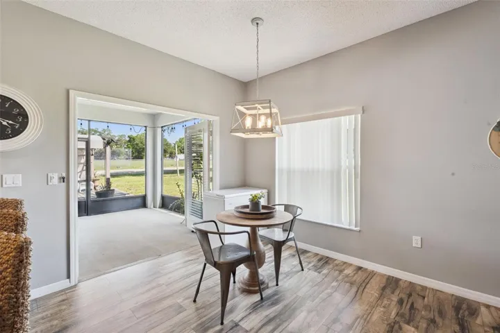 French Doors lead on to the Screened-in Lanai