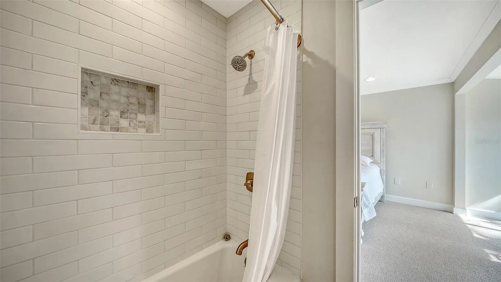 Shower/tub combination in primary bath.