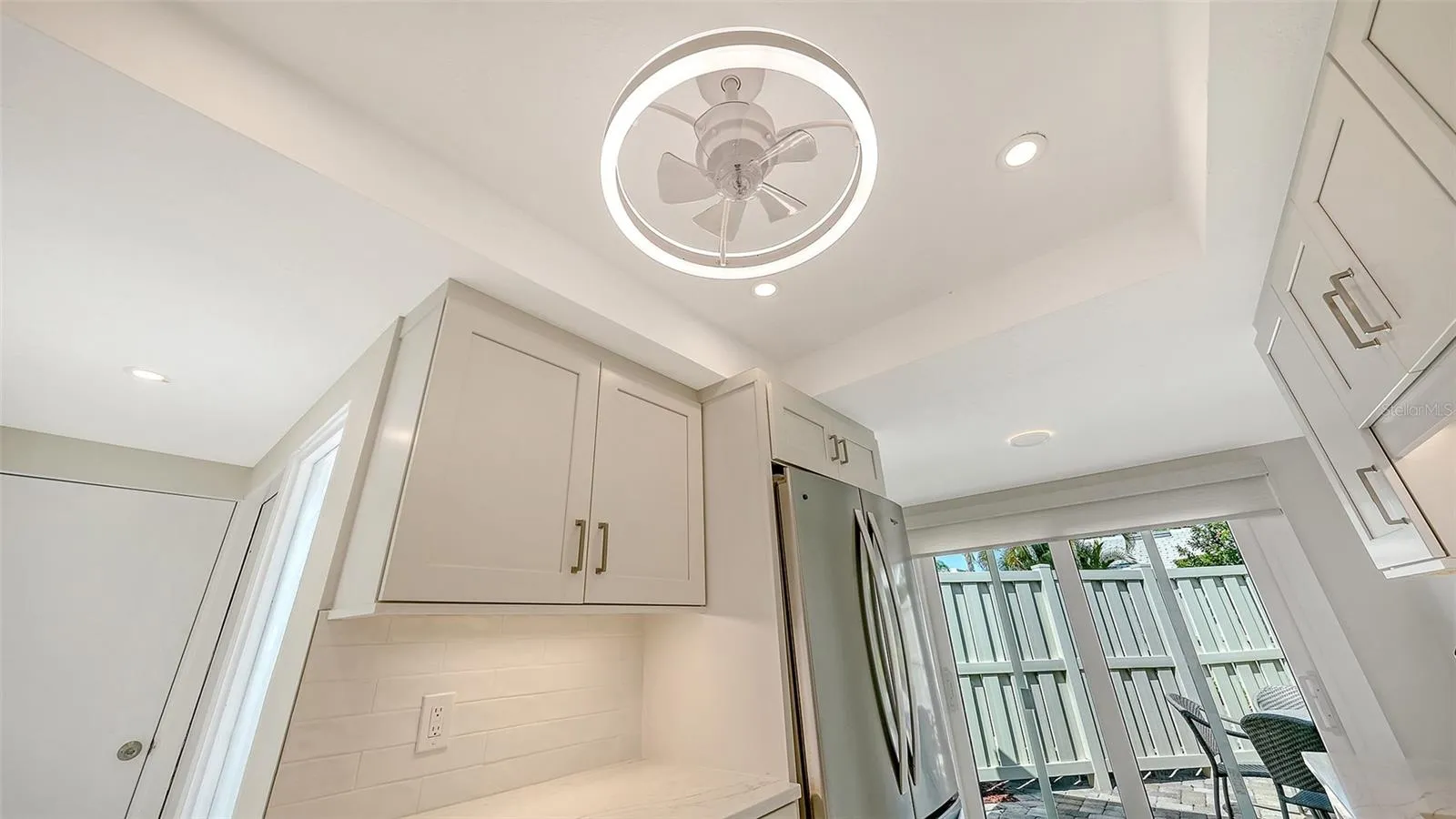 Recessed lighting and new fandelier in kitchen.