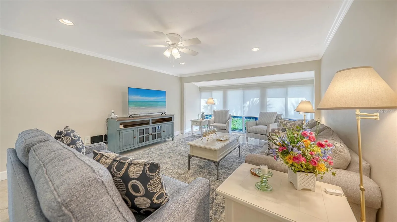 Surprisingly large living space with neutral paint, soft recessed lighting, and new gleaming baseboards.