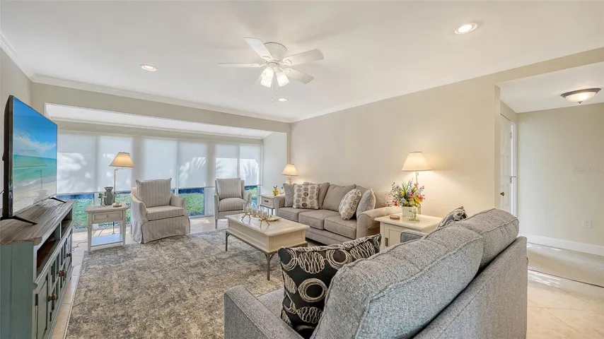 Floor to ceiling shades offer privacy and coziness.
