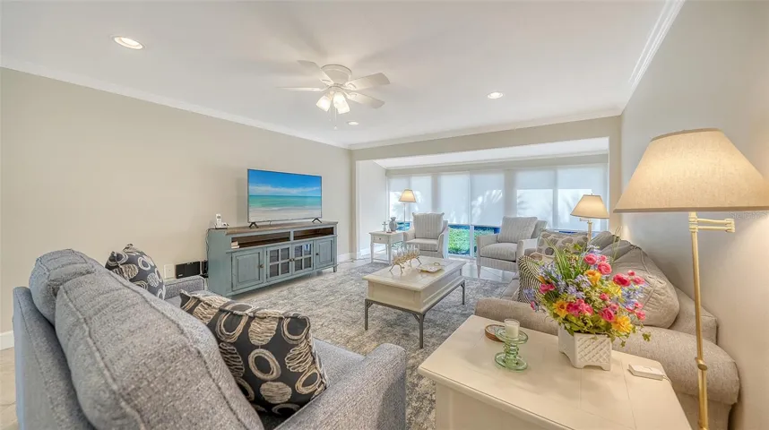 Surprisingly large living space with neutral paint, soft recessed lighting, and new gleaming baseboards.