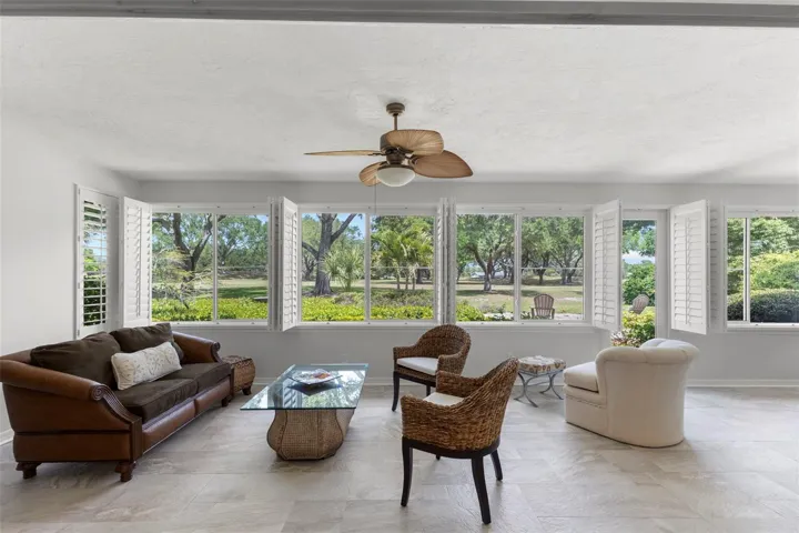 LOOK AT THAT VIEW FROM LIVING ROOM TO BACK PORCH