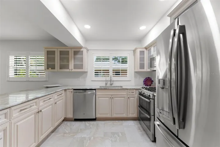 VIEW FROM LAUNDRY ROOM AND GARAGE TO THE RIGHT.